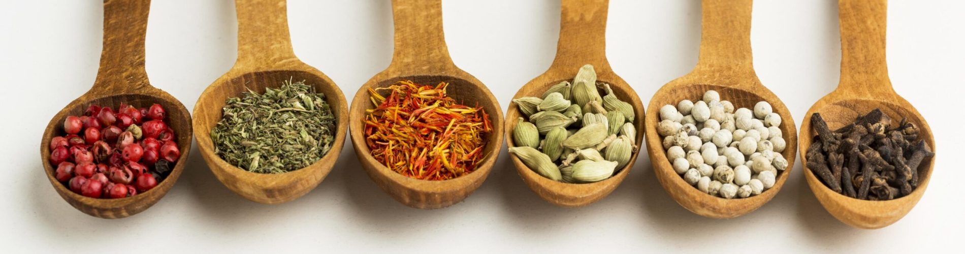 copy-space-variety-spices-wooden-spoons