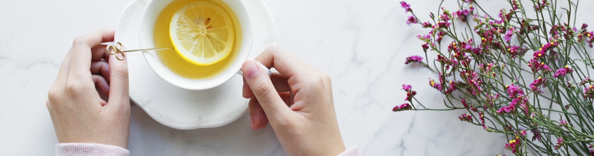 Aerial view of woman with a hot cup of tea